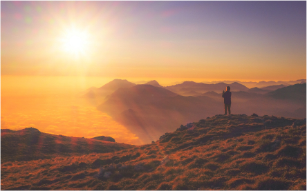 man standing on mountain